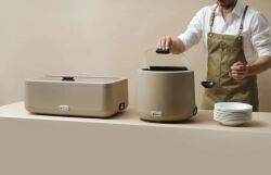 buffe med chafing dish, soppvärmare i beige, kock
